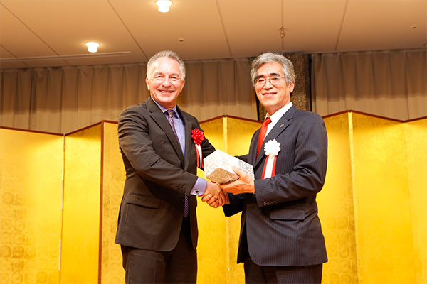 Two Japanese Men Shaking Hands